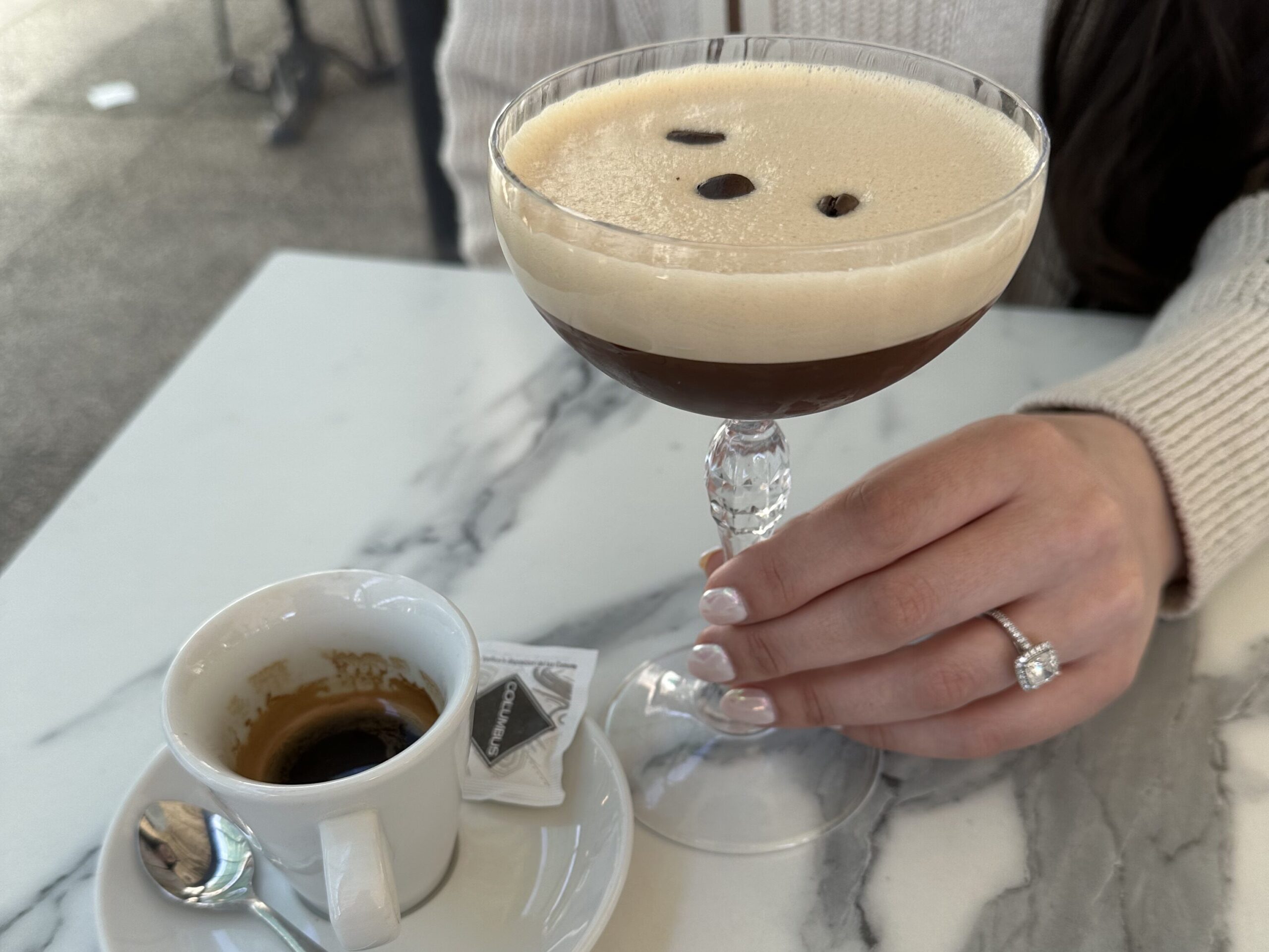 espresso martini and espresso on marble table